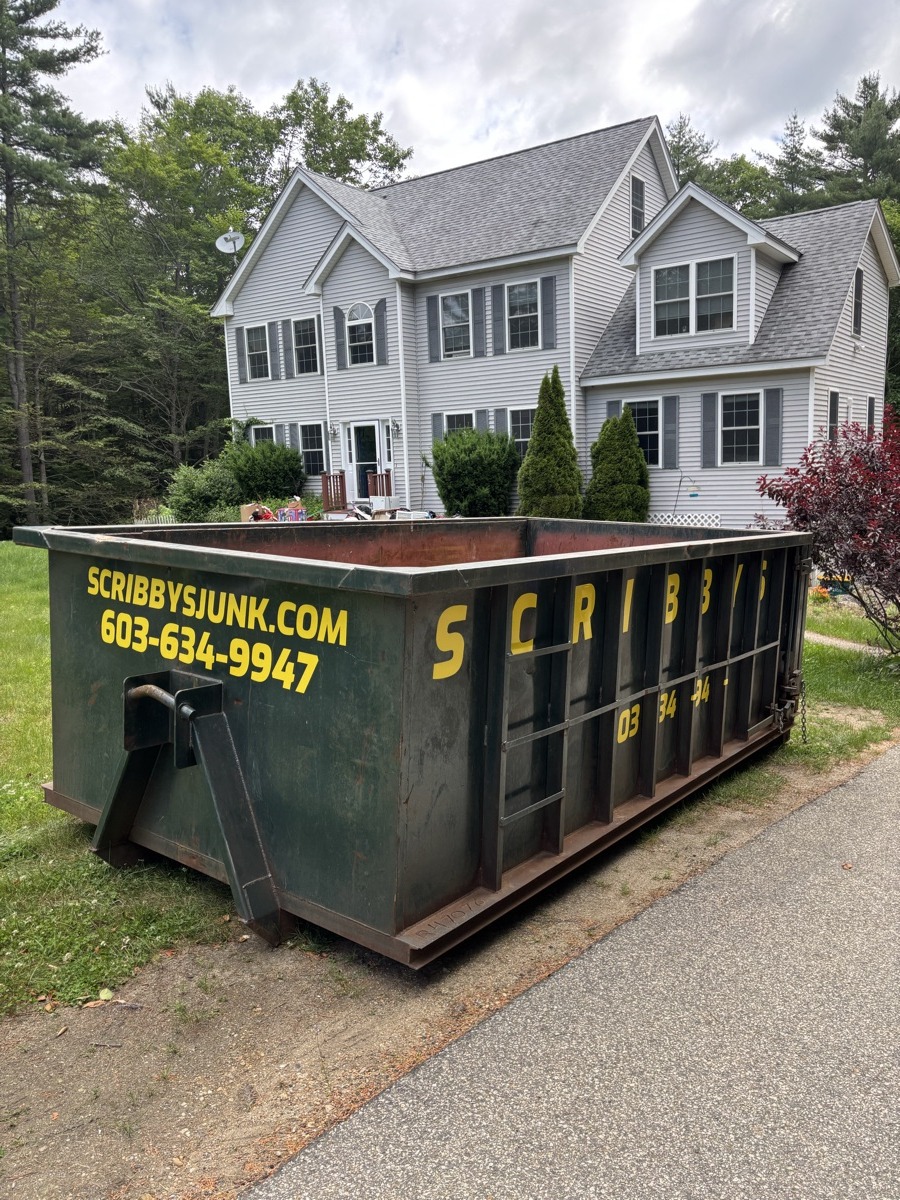 A Scribby's dumpster at a Hudson job. Maybe a roof tear-off in a postwar neighborhood, or a renovation on one of the older streets near the river.