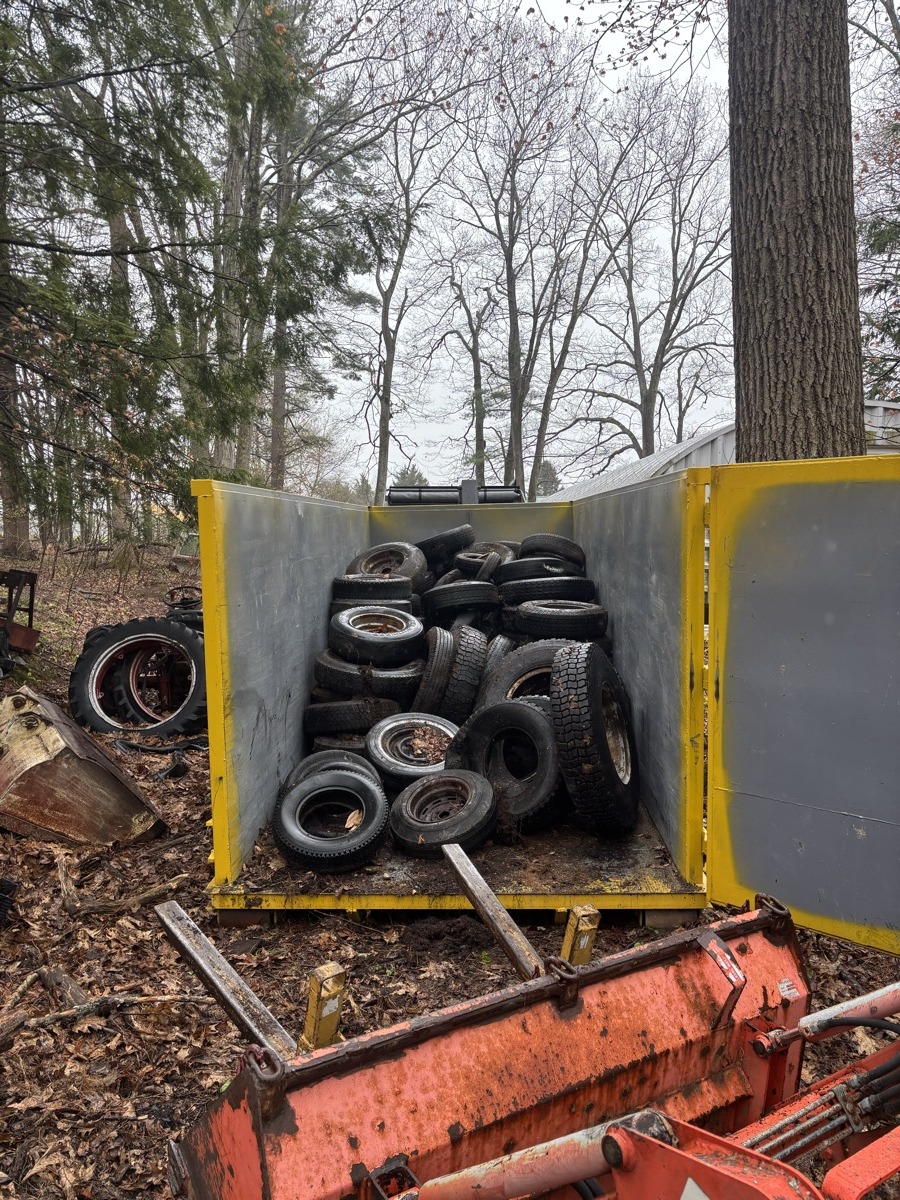 A Scribby's dumpster on a Seabrook driveway. Maybe a cottage renovation near the beach, or a residential project off Route 1.