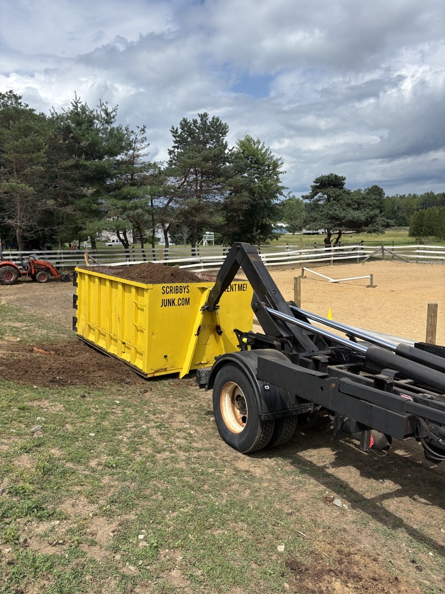 A Scribby's dumpster at a Barrington job. Maybe a renovation on a wooded back road, or a camp cleanout near one of the lakes.