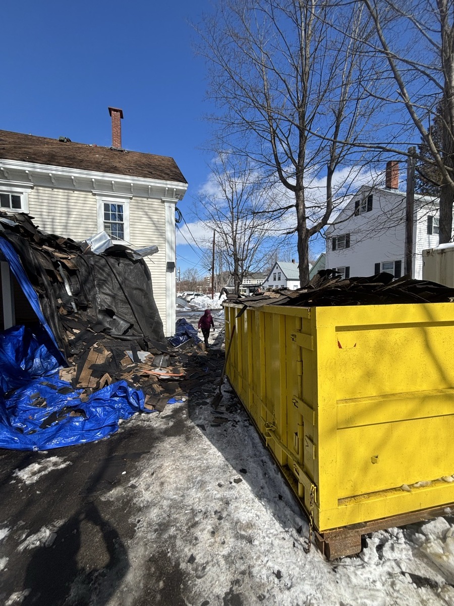Scribby's dumpster on a Methuen driveway. Maybe an older home near downtown, or a contractor job in one of the newer subdivisions.