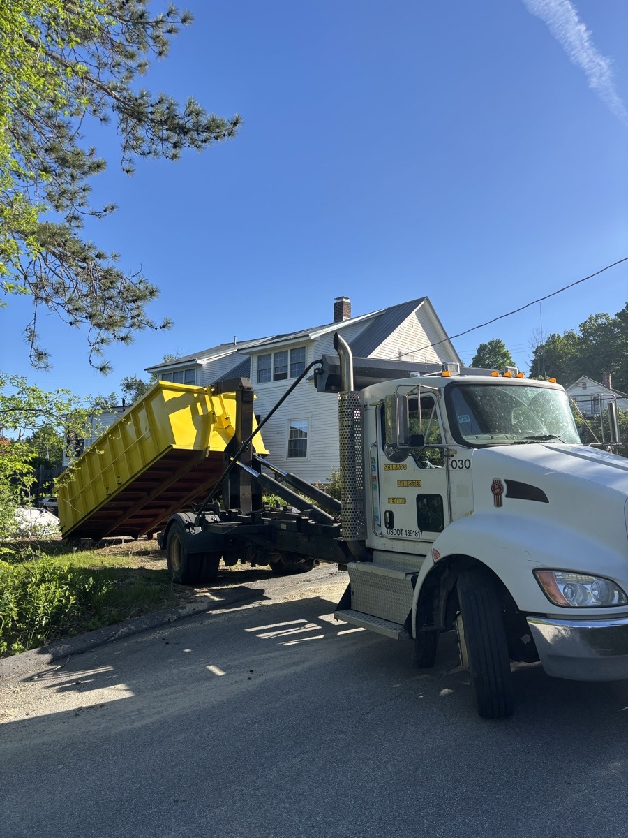 A Scribby's dumpster at a Madbury job. Maybe a renovation on a long wooded driveway, or an outbuilding cleanout on one of the back roads.